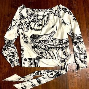 Beautiful off the shoulder blouse with handkerchief tie.